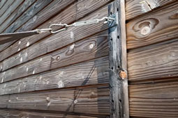Renfort maison bardage bois pour installation toile d'ombrage