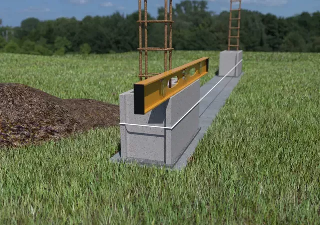 Construction d'un muret de clôture - Vérifier niveau premier parpaing