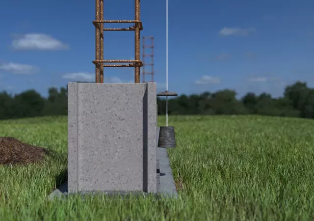 Construction d'un muret de clôture - Vérifier niveau avec fil à plomb